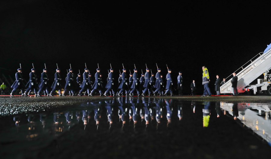 Members of the German honor guard march across the tarmac in preparation for the arrival ceremony for President Barack Obama at Tegel International Airport in Berlin on Wednesday.