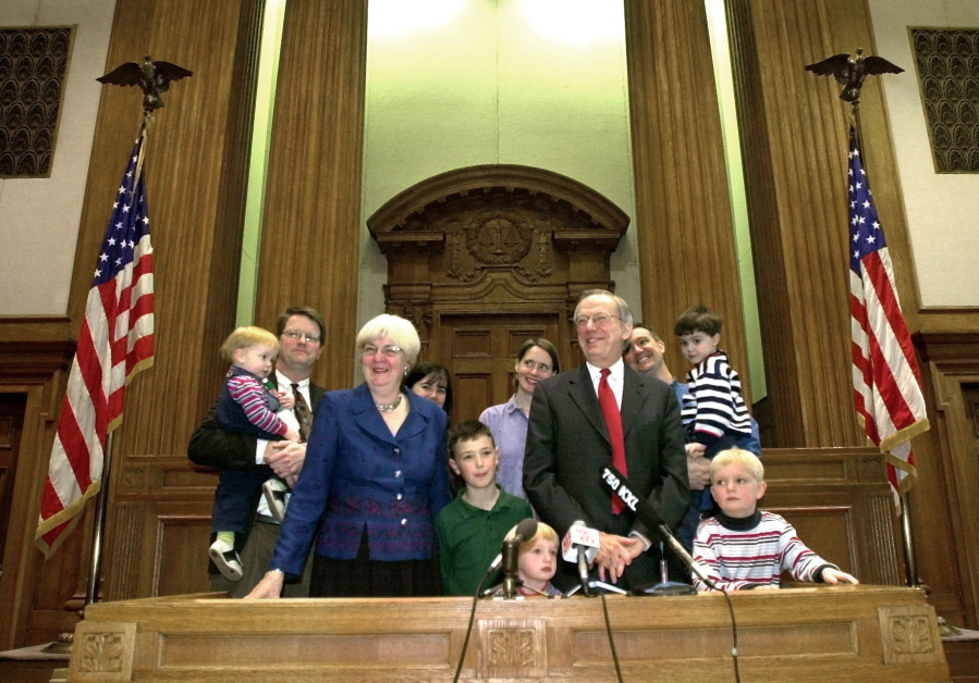 Oregon Attorney General Hardy Myers, right front, was joined by his wife, Mary Ann, left front, and other family members Nov. 12, 2003, at Gus Solomon Courthouse in Portland as he announced his plans to run for re-election. Myers died Tuesday at 77 from complications of pneumonia.