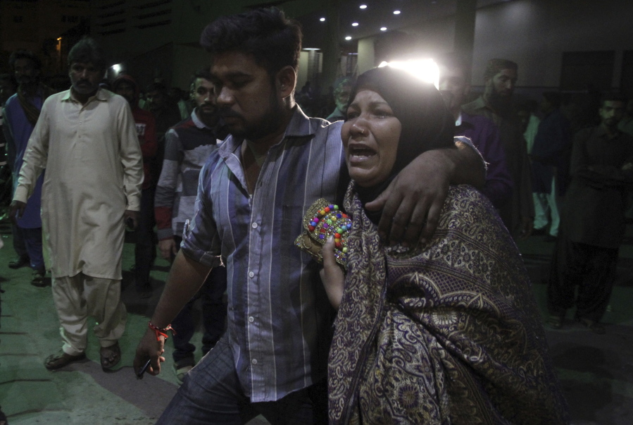 A Pakistani woman weeps for a family member, injured in a bomb blast at a Sufi shrine, at a local hospital in Karachi, Pakistan, Saturday, Nov. 12, 2016. A Pakistani official says a bomb blast at the shrine of Sufi saint Shah Bilal Noorani, has killed dozens people and wounded more than 100 in the country&#039;s southwest.