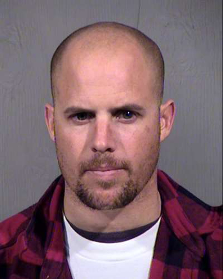 FILE - This Jan. 27, 2016, file photo, provided by the Maricopa County Sheriff&#039;s Office shows Jon Ritzheimer, who was arrested in Arizona on Jan. 26, 2016, in connection with the occupation of the Malheur National Wildlife Refuge in Oregon. Ritzheimer, who pleaded guilty to conspiracy as part of a plea bargain, the same charge that a just acquitted seven other occupiers were acquitted of last week, says his lawyer is talking with prosecutors about withdrawing his guilty plea as a possible future option.