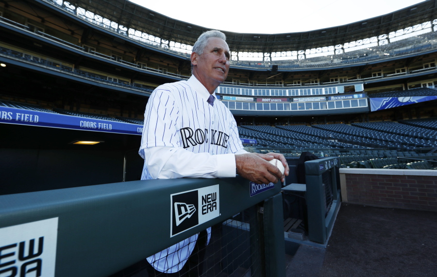 Newly named Colorado Rockies manager Bud Black poses for photographers on the diamond in Coors Field following a news conference to introduce him as the new skipper on Monday, Nov. 7, 2016, in Denver. Black succeeds Walt Weiss, who left after four seasons as manager at the conclusion of the regular season.