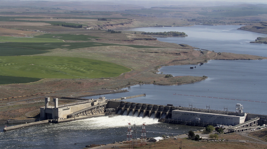 FILE - In this 2013 file photo, the Ice Harbor Dam on the Snake River is seen from the air near Pasco, Wash. There is a renewed push to remove Ice Harbor and three other dams on the Snake River to save wild salmon runs.