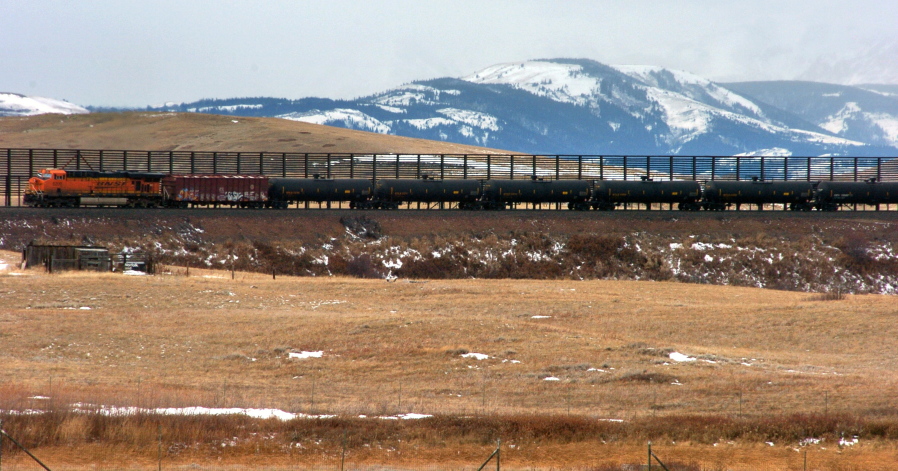 A train hauls oil into Glacier National Park near the Badger-Two Medicine National Forest in northwest Montana.  U.S. officials said they&#039;ve canceled 15 oil and gas leases in an area bordering Glacier National Park that&#039;s considered sacred to the Blackfoot tribes of the U.S. and Canada. Interior Secretary Sally Jewell said the Wednesday, Nov. 16, 2016, move will preserve the 130,000-acre Badger-Two Medicine area within the Lewis and Clark National Forest. The Badger-Two Medicine is the site of the creation story for members of Montana&#039;s Blackfeet Nation and the Blackfoot tribes of Canada.