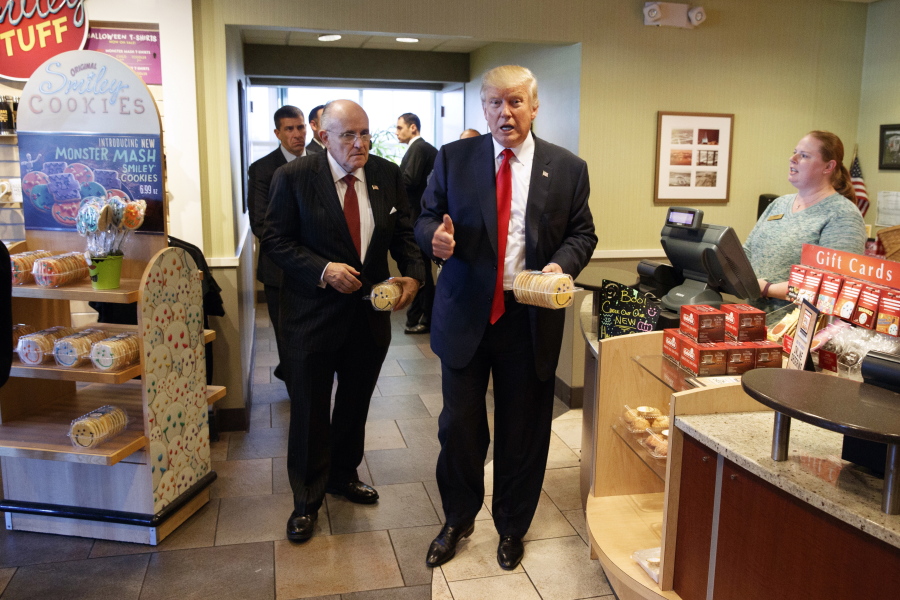 New York mayor Rudy Giuliani, left, and then-Republican presidential candidate Donald Trump buy cookies in October at an Eat&#039;n Park in Moon Township, Pa. Trump prefers fast-food restaurants, feeling their food is safer.
