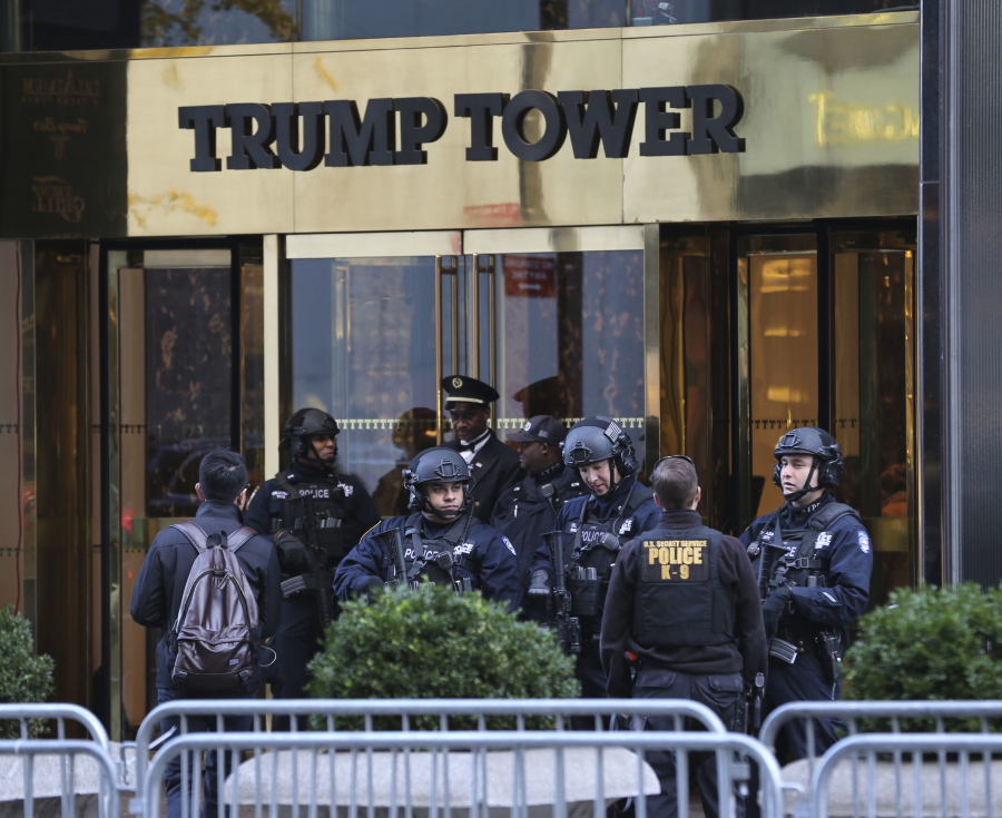 Security personnel stand at the front entrance of Trump Tower in New York on Thursday.
