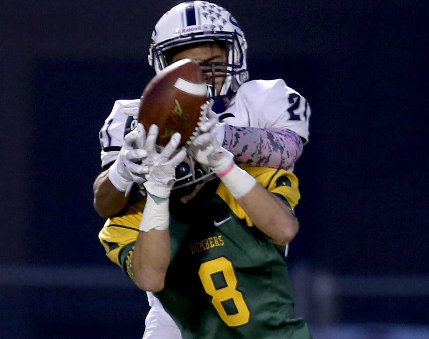 Richland High School's Alex Chapman (8) intercepts a pass to Skyview High School's Jeremiah Wright (21) Saturday during a 4A semifinal game at Neil F. Lampson Stadium in Kenenwick.