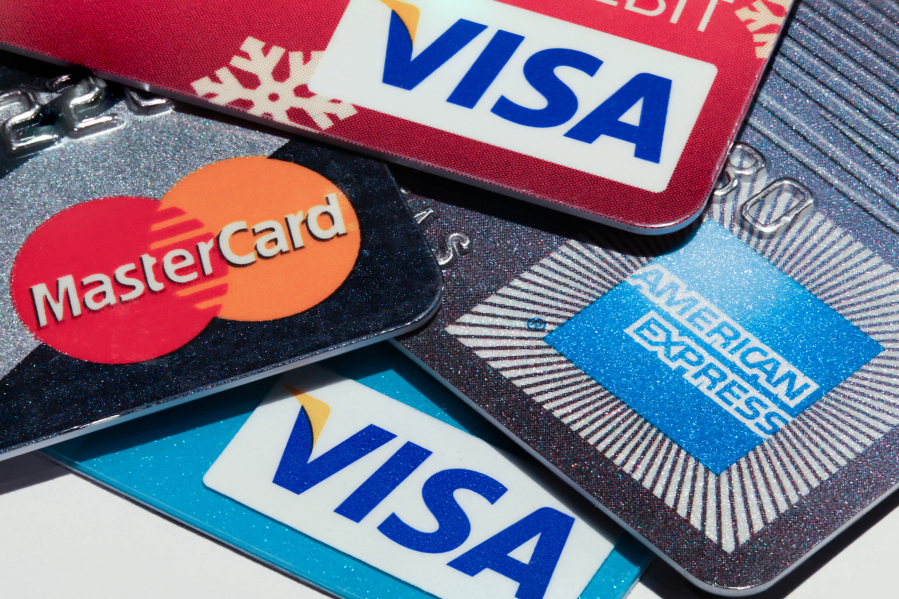 The use of computer-chip cards instead of the magnetic-stripe credit cards has caused more holiday-season thieves to move toward online shopping fraud.