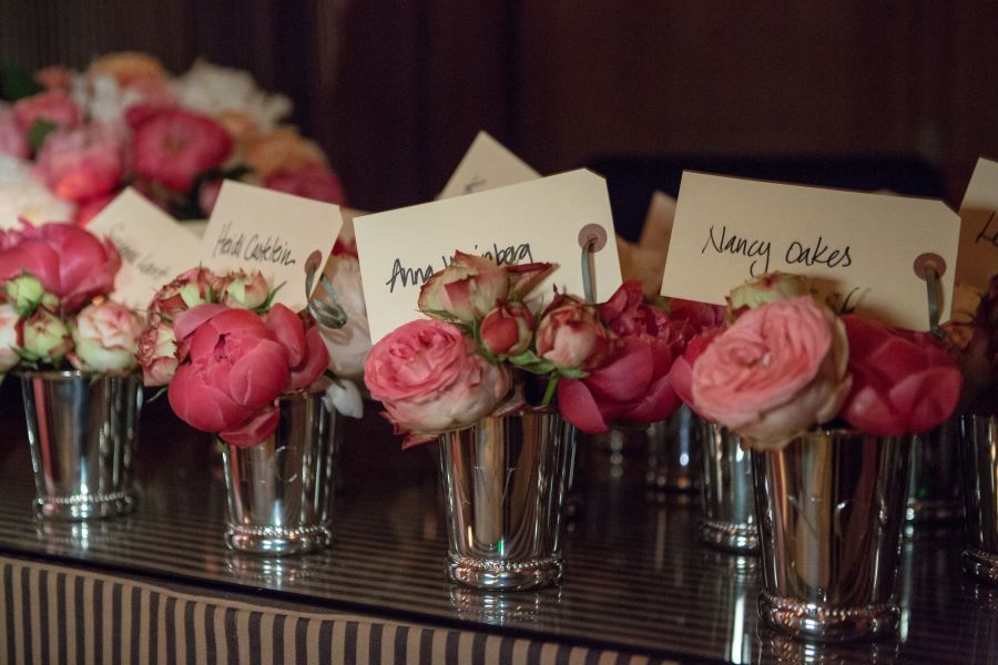 Place cards can also be party favors, such as these small flower bouquets at Fulk&#039;s house.