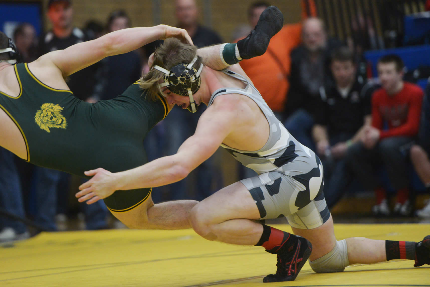 Union's Tommy Strassenberg heaves West Linn's Sean Harman during the Pac-Coast wrestling tournament at Mountain View High School on Friday, December 30, 2016. Harman beat Strassenberg to win the 160-pound weight class.
