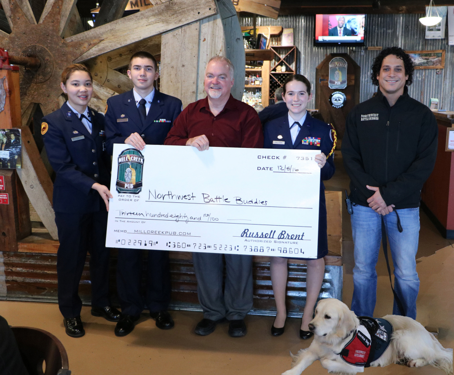 Battle Ground: Prairie High School ROTC cadets raised $1,380 for Northwest Battle Buddies, a nonprofit that trains and pairs service dogs with combat veterans.