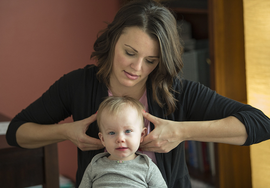 Chiropractor Cecelia Mikles checks 13-month-old Briar Freitas&#039; cranium bones during an appointment Nov. 28. Mikles discovered Briar&#039;s cranium bones were shifting and uneven.