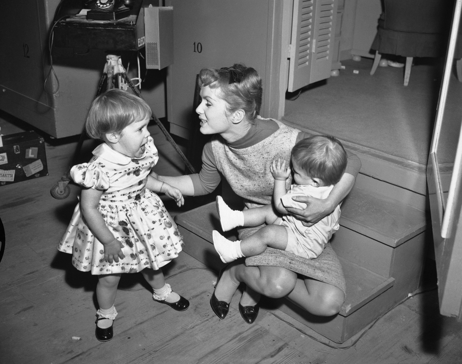Debbie Reynolds is visited on the set of &quot;Say One for Me&quot; by her children, Carrie Fisher, 2, and Todd, 1, on Feb. 27, 1959.