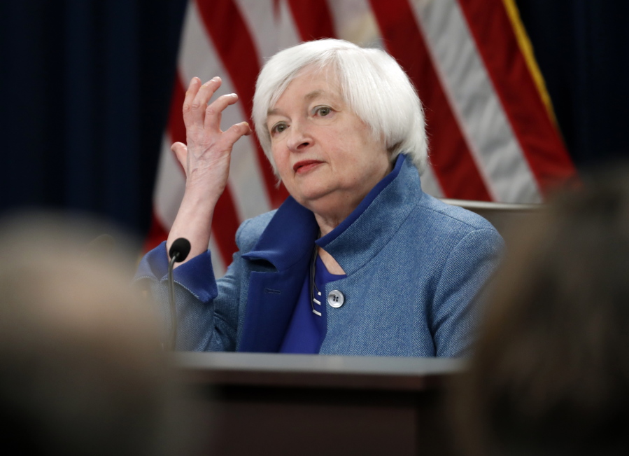 Federal Reserve Board Chair Janet Yellen listens to a reporter&#039;s question during a news conference about the Federal Reserve&#039;s monetary policy, Wednesday, Dec. 14, 2016, in Washington. The Federal Reserve is raising a key interest rate for the first time in a year, reflecting a resilient U.S. economy and expectations of higher inflation. The move will mean modestly higher rates on some loans.