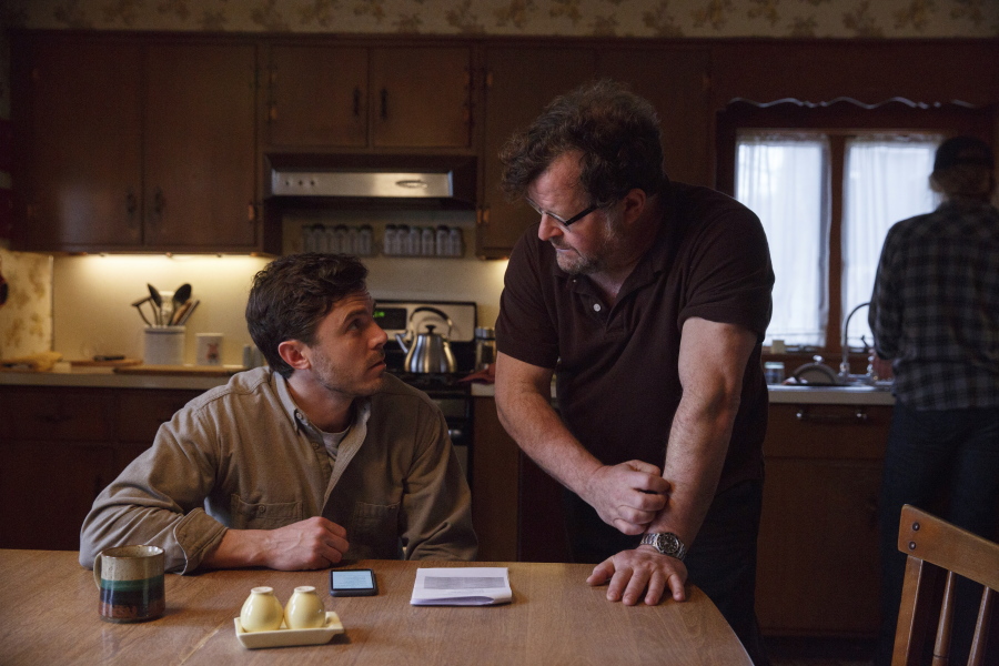 Casey Affleck, left, chats with writer-director Kenneth Lonergan during the filming of &quot;Manchester by the Sea.&quot; (Claire Folger/Roadside Attractions and Amazon Studios)
