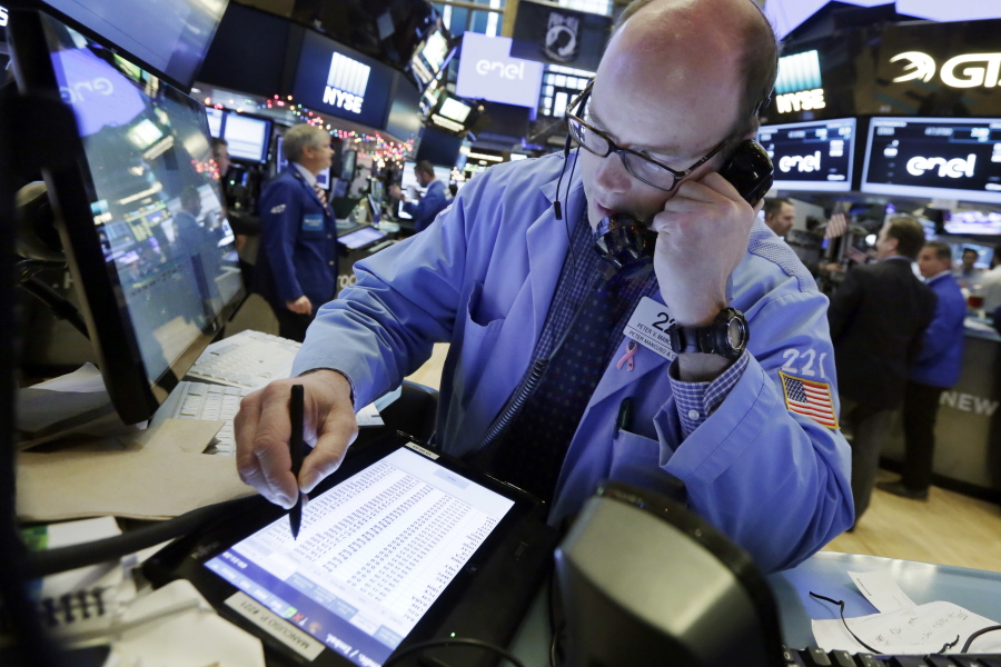 Trader Kevin Mancuso works on the floor of the New York Stock Exchange on Friday. High stocks are expected during 2017.