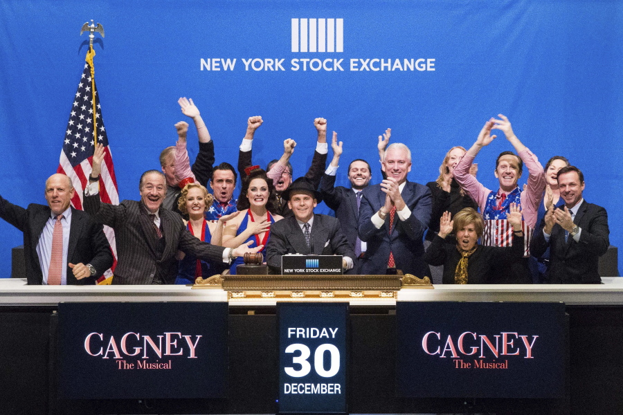 Actor Robert Creighton, one of the stars of &quot;Cagney The Musical,&quot; joins representatives and actors from the show on the podium Friday to ring the final closing bell of 2016 at The New York Stock Exchange in New York.