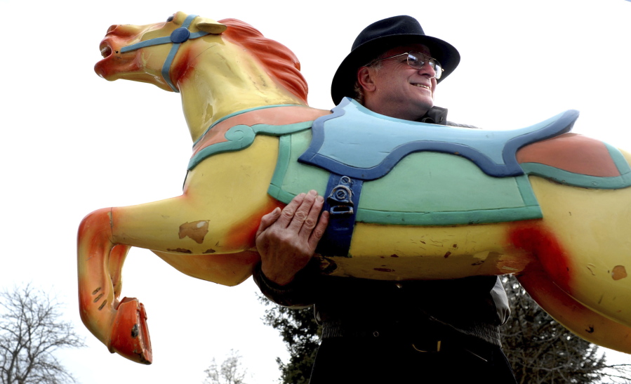 Coeur d&#039;Alene Carousel Foundation president Richard Le Francis brings a horse from the Playland Pier carousel to its former location near Independence Point in Coeur d&#039;Alene, Idaho on March 7, 2011. Current foundation President Cari Fraser tells The Spokesman-Review that plans to have the carousel running this year changed after poor weather in October and design changes delayed work on a new building in downtown Coeur d&#039;Alene.