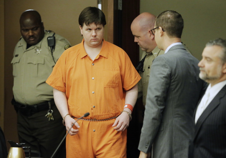 Justin Ross Harris enters court for sentencing Monday in Marietta, Ga. A judge on Monday handed down a sentence of life in prison without the possibility of parole for Harris, convicted of murder by jurors who believed he had intentionally left his toddler son in a hot SUV to die.