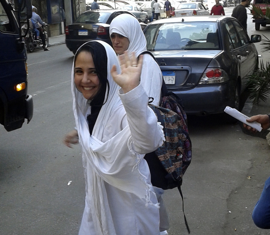 American citizen Aya Hijazi waves as she leaves a court in Cairo after hearing in 2015. Family and friends of an American jailed in Egypt for nearly three years are hoping her time in custody may end soon. Hijazi, 29, grew up in Falls Church, Va. and is a dual citizen of the U.S. and Egypt. After receiving her degree in conflict resolution from George Mason University in 2009, she returned to her native country, and with her Egyptian husband, started a foundation to help homeless children.