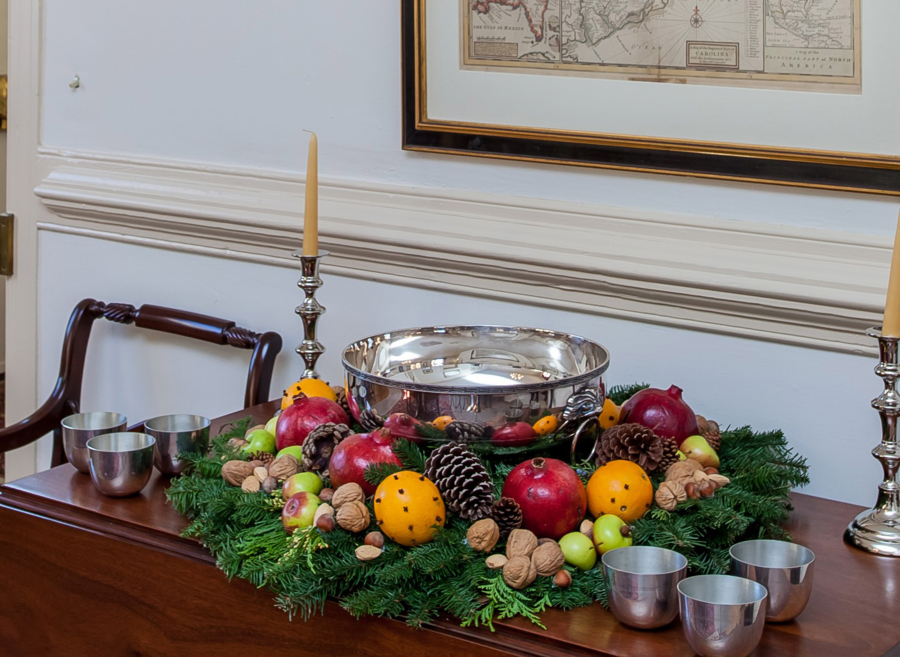 Once you have the technique of wiring greenery into a frame, go wild. Hot-glue fruits and nuts into a wreath sized to fit around your favorite punch bowl and add a festive look to your holiday party -- and stud the oranges with cloves for an amazing fragrance.