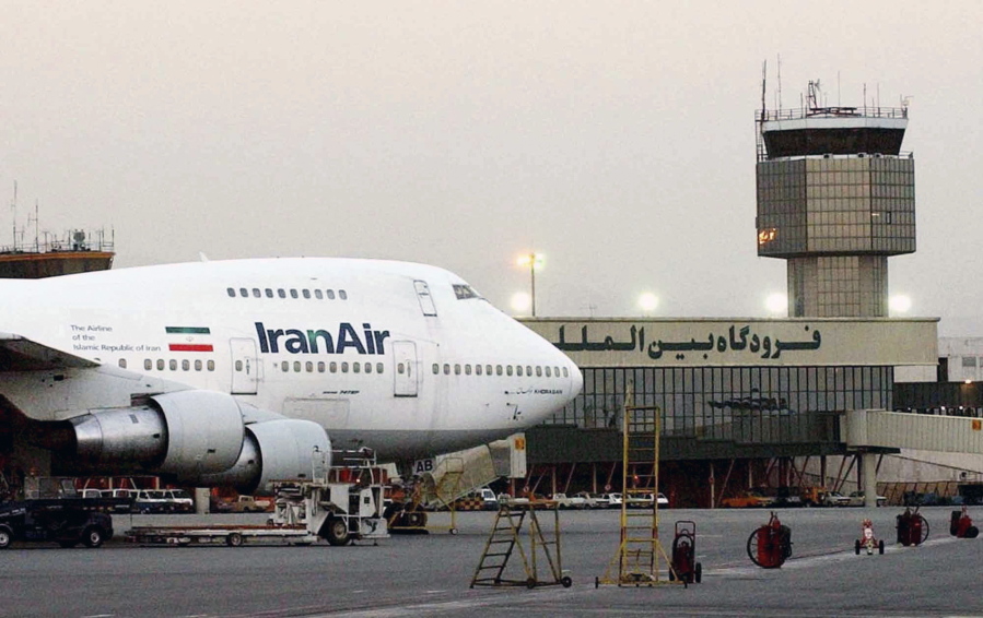 In this June 2003 file photo, a Boeing 747 of Iran&#039;s national airline is seen at Mehrabad International Airport in Tehran. Iran said Sunday it has finalized a $16.8 billion deal with Boeing to purchase 80 passenger planes, a deal made possible by last year&#039;s landmark nuclear agreement.