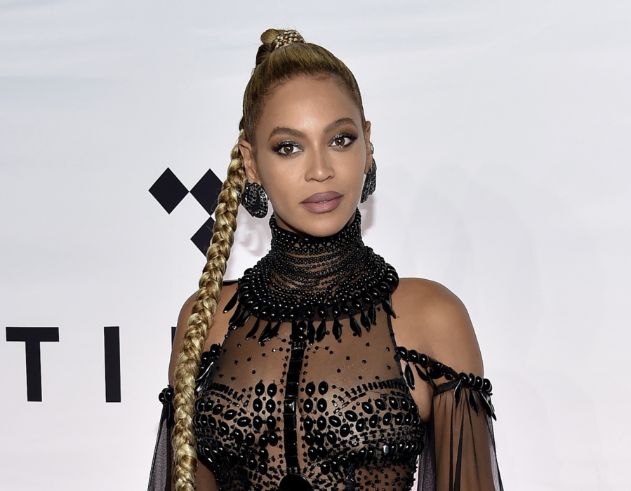 Beyonce Knowles attends the Tidal X: 1015 benefit concert Oct. 15 in New York. Beyonce set a record for earning Grammy nominations, announced Tuesday, in the rock, pop, R&amp;B and rap categories in the same year with her diverse album, &quot;Lemonade.&quot; Only two other acts have earned nominations in those same four categories, Paul McCartney and Janet Jackson, but never in the same year.