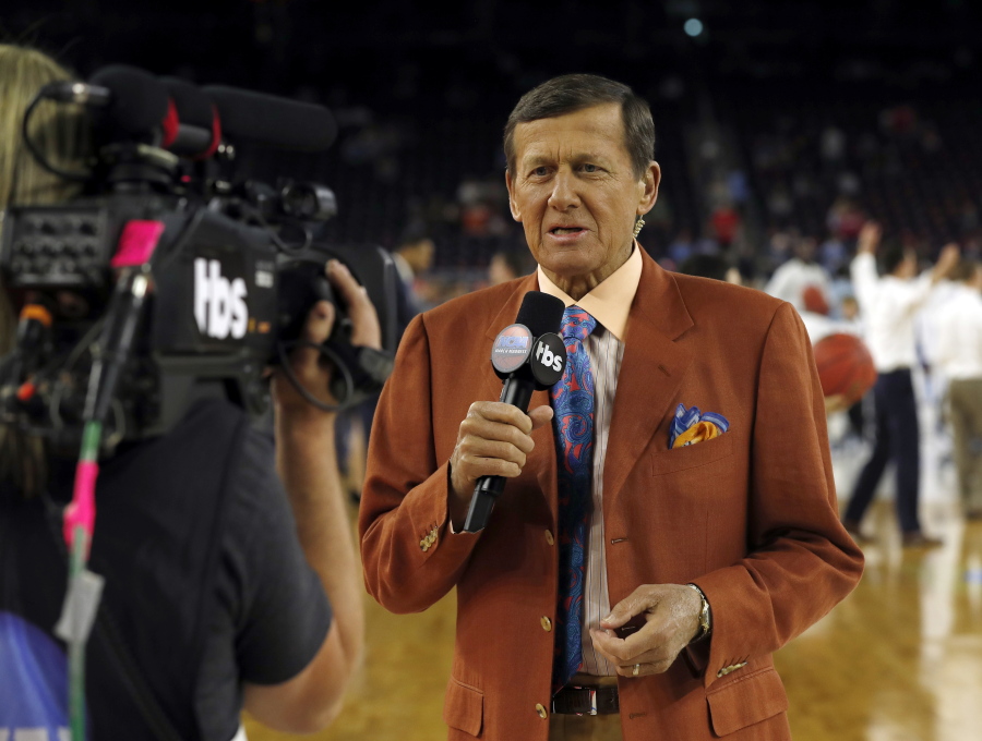 Craig Sager, the longtime NBA sideline reporter famous for his flashy suits and probing questions, has died after a batter with cancer, Turner Sports announced Thursday, Dec. 15, 2016. He was 65. (AP Photo/David J.