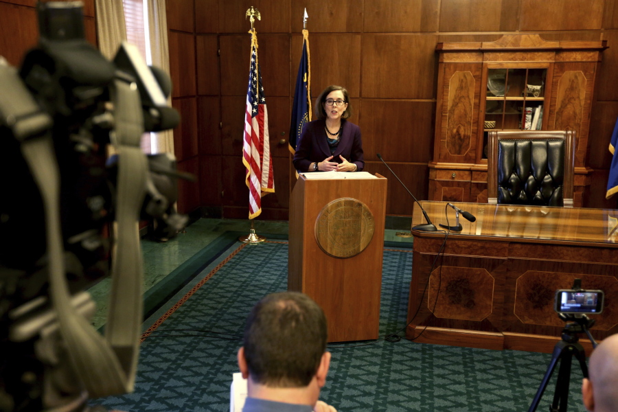 Oregon&#039;s Gov. Kate Brown speaks about her proposed 2017-2019 budget at the Oregon State Capitol in Salem, Ore., on Thursday, Dec. 1, 2016.