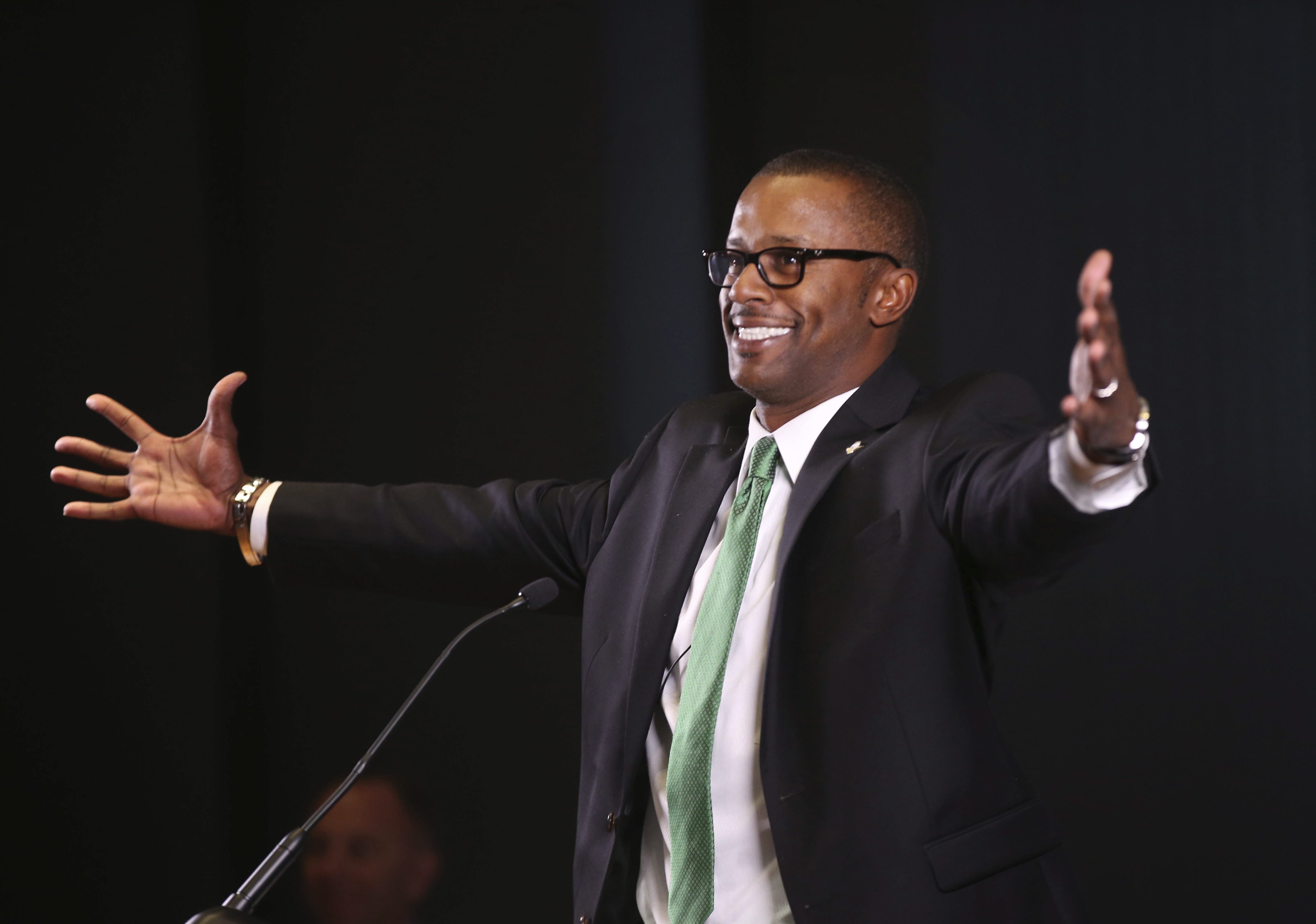 New University of Oregon NCAA college football coach Willie Taggart jokes with the audience during an introductory press conference in Eugene, Ore., Thursday Dec. 8, 2016.