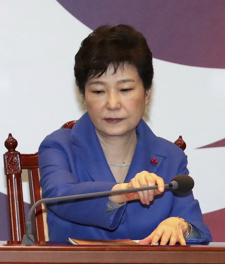 South Korean President Park Geun-hye adjusts a microphone during an emergency Cabinet meeting Friday in Seoul, South Korea.