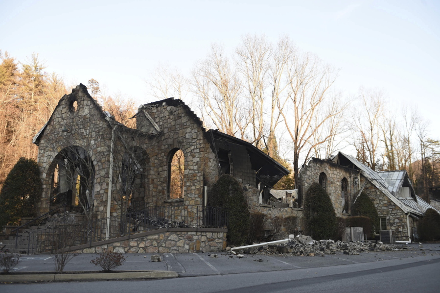 The stone walls are all that stands of the Roaring Fork Baptist Church in Gatlinburg, Tenn., Friday, Dec. 2, 2016, following the devastating wildfires from Monday night, Nov. 28.