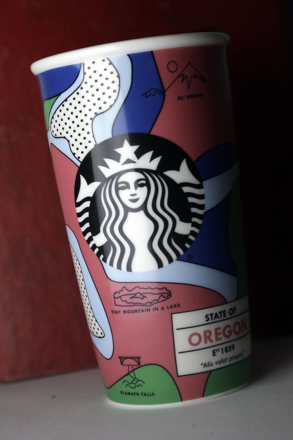 This coffee travel mug that Seattle-based coffee chain Starbucks has introduced bears sketches of notable Oregon landmarks, including Crater Lake National Park, food carts in Portland and Ashland&#039;s Shakespeare Festival. Shown on the mug at lower left is a waterfall design identified as &quot;Klamath Falls,&quot; but in fact no such waterfall exists. Klamath Falls is a town in Oregon.