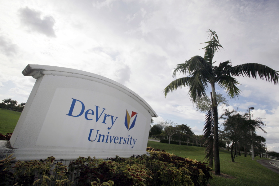 FILE - This Nov. 24, 2009, file photo, shows the entrance to the DeVry University in Miramar, Fla. Since Donald Trump&#039;s election on Nov. 8, 2016, shares in the parent company of DeVry University have increased to their highest value in more than a year.