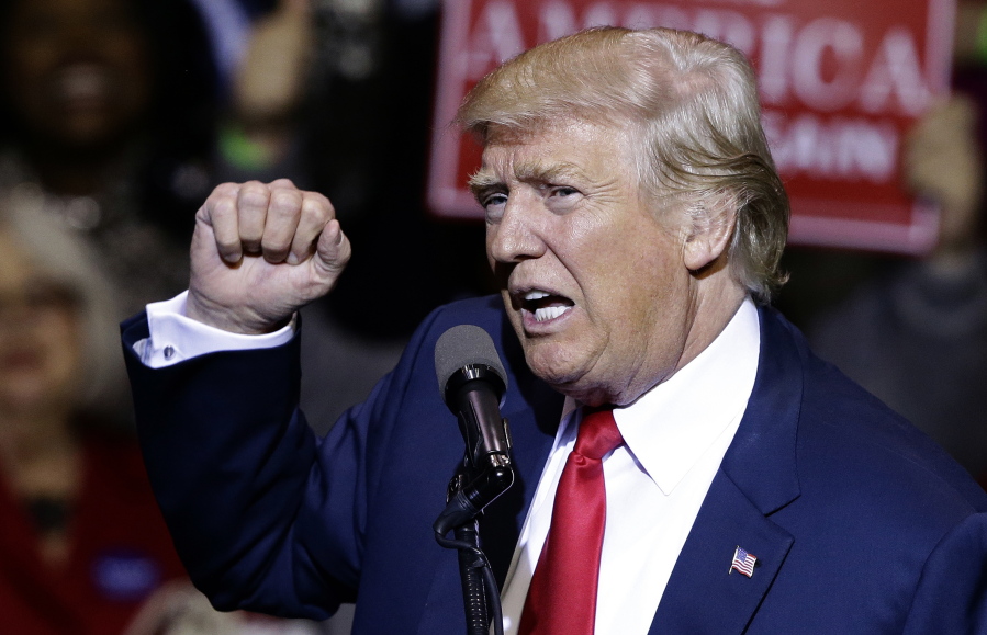 President-elect Donald Trump speaks to supporters during a rally in Fayetteville, N.C. Trum&#039;s promise to&quot;work something out&quot; for immigrants brought here illegally as kids is dividing fellow Republicans, underscoring how difficult it will be for Congress to take any action on immigration, whether it&#039;s building a wall or dealing with immigrant youths.