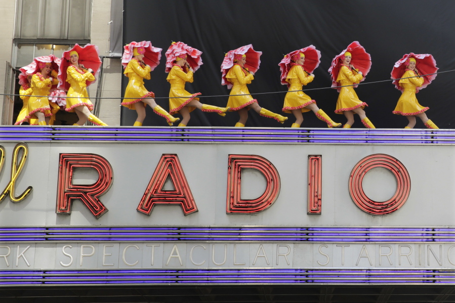 Dancers from the Radio City Rockettes promote their &quot;New York Spectacular&quot; show June 7 by performing on the marquee of Radio City Music Hall in New York. The Radio City Rockettes have been signed on to dance at President-elect Donald Trump&#039;s inauguration next month.