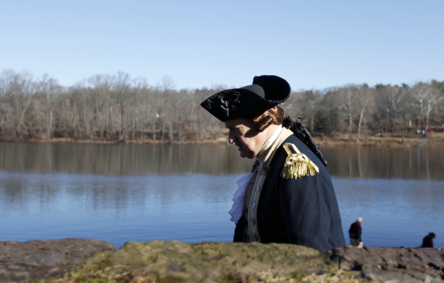 John Godzieba as Gen. George Washington, walks along the bank of the Delaware River before the re-enactment of Washington&#039;s Christmas 1776 crossing of the river, the trek that turned the tide of the Revolutionary War, Sunday, Dec. 25, 2016, in Washington Crossing, Pa. During the crossing, boats ferried 2,400 soldiers, 200 horses and 18 cannons across the river, and the troops marched eight miles downriver before battling Hessian mercenaries in the streets of Trenton.