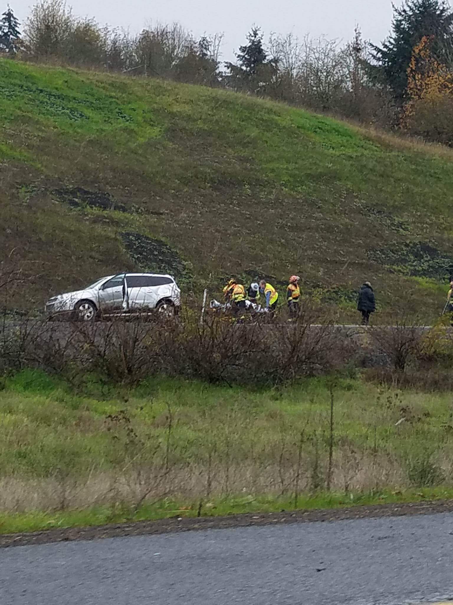 Two people were injured in a multiple-vehicle crash involving a school bus on Interstate 205 Friday afternoon. The school bus had about a dozen kids on board though none were reportedly injured.