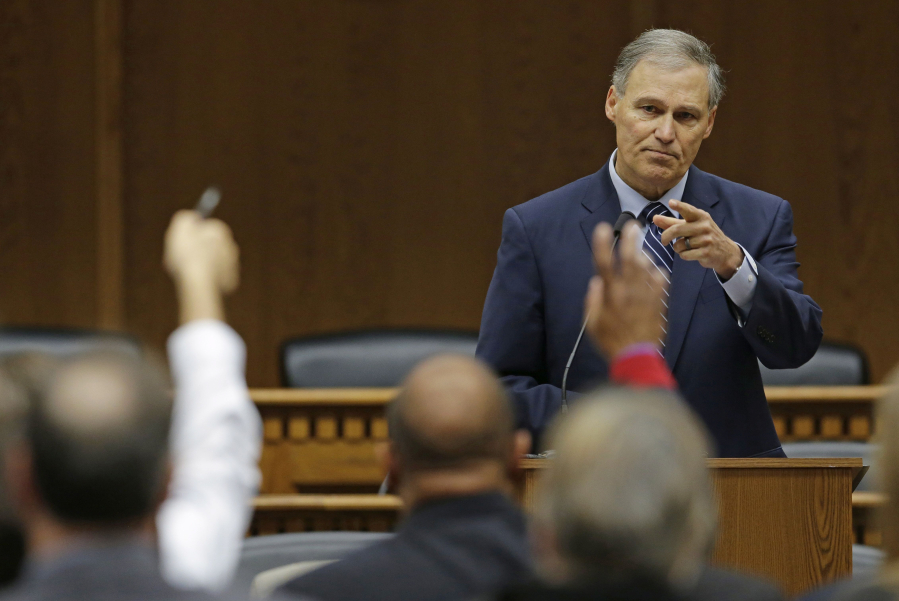 Washington Gov. Jay Inslee takes questions from reporters Jan. 8, 2015, at the annual Associated Press Legislative Preview in Olympia. (AP Photo/Ted S.