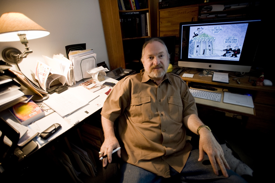Monte Wolverton, nationally syndicated editorial cartoonist, in his Clark County studio.