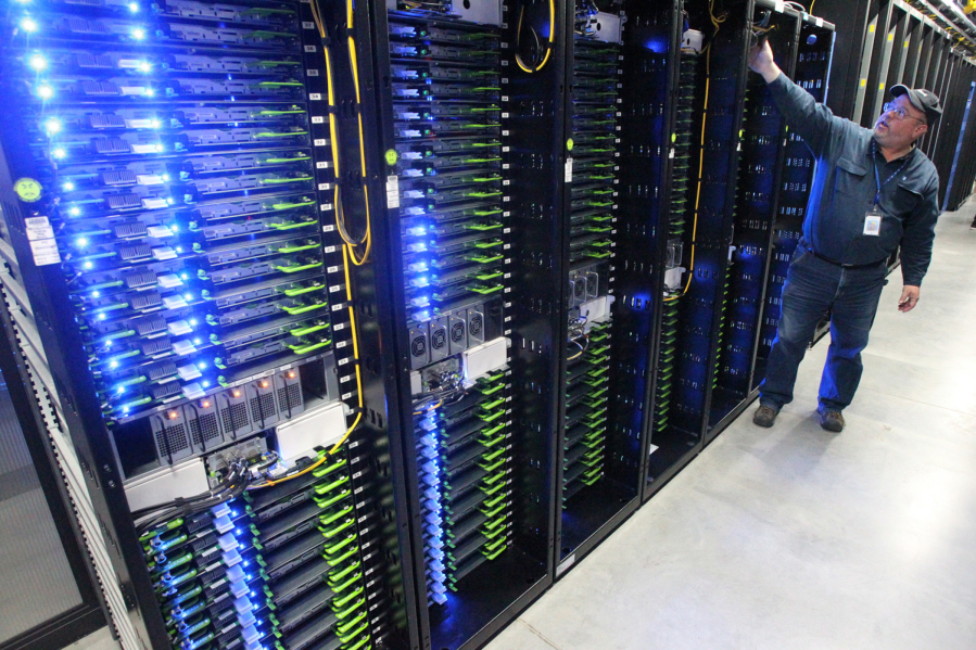 Facebook&#039;s Prineville data center servers store users&#039; photos and other data in Prineville Ore., in 2013.