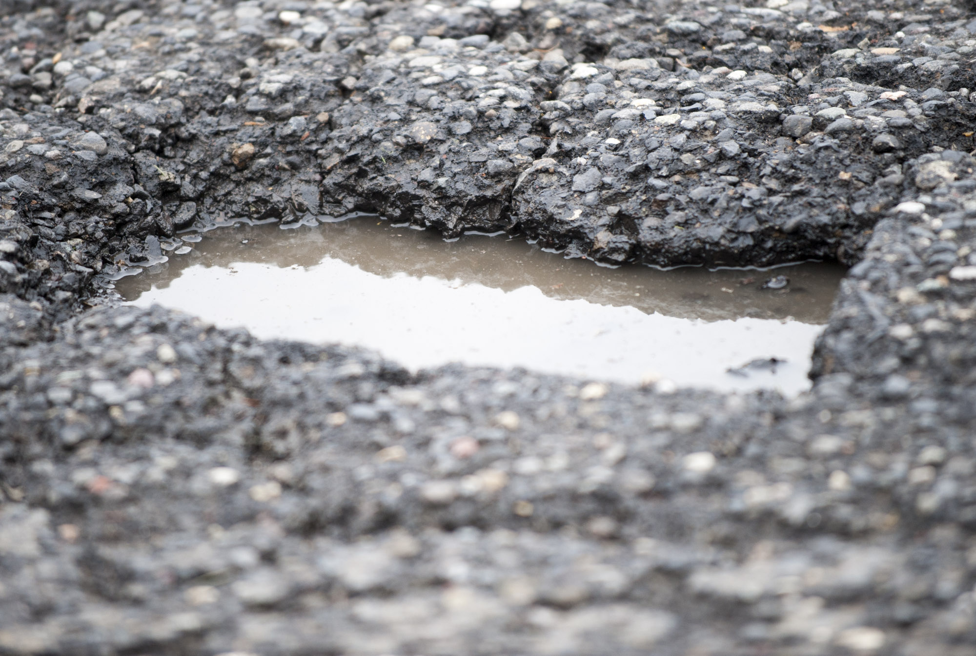 A pothole is seen at the intersection of Northeast 18th Street and 134th Avenue in Vancouver in January 2016.