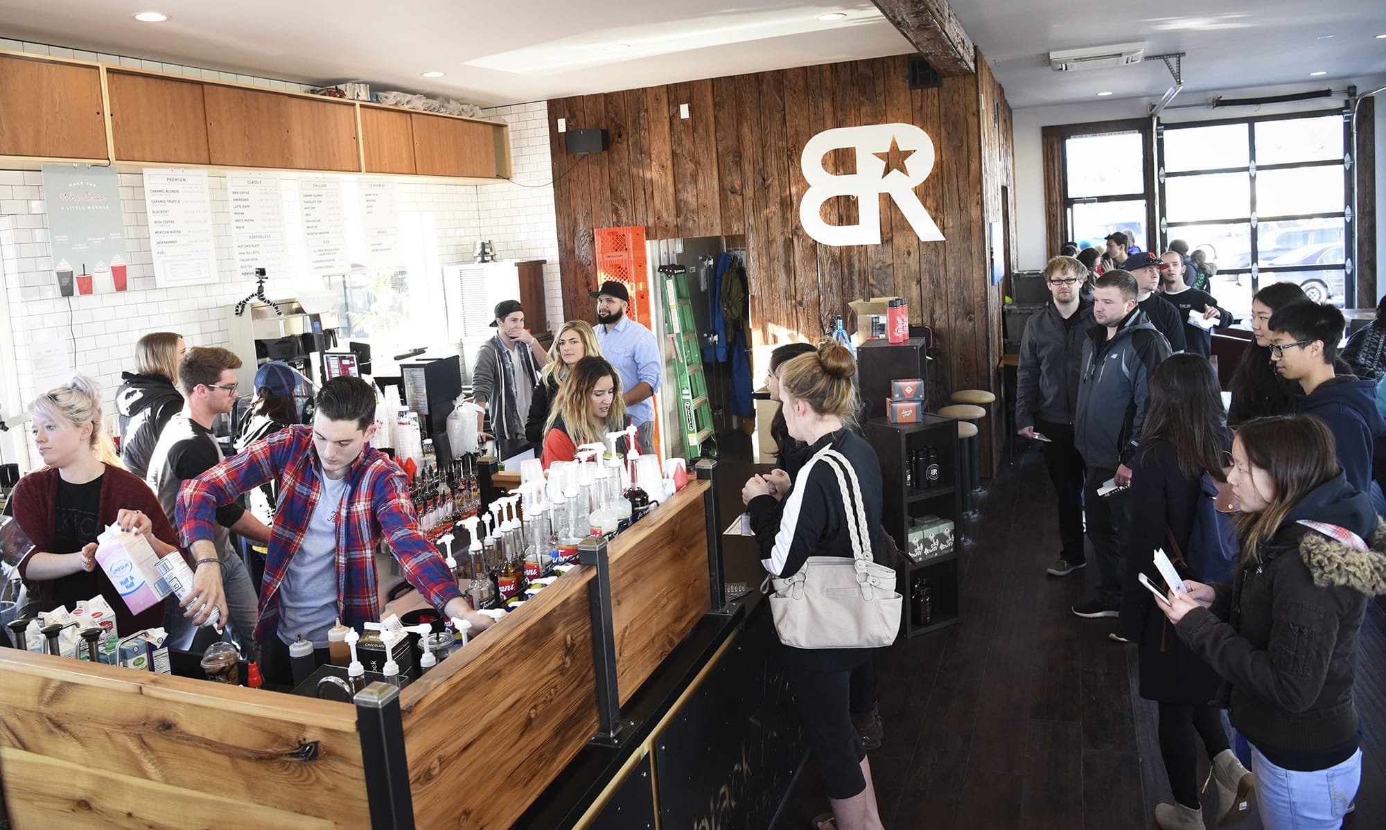 Lines of people crowd the new Black Rock Coffee Bar on Northeast Fourth Plain Boulevard and Andresen Road in Vancouver for a free beverage during the grand opening Friday.