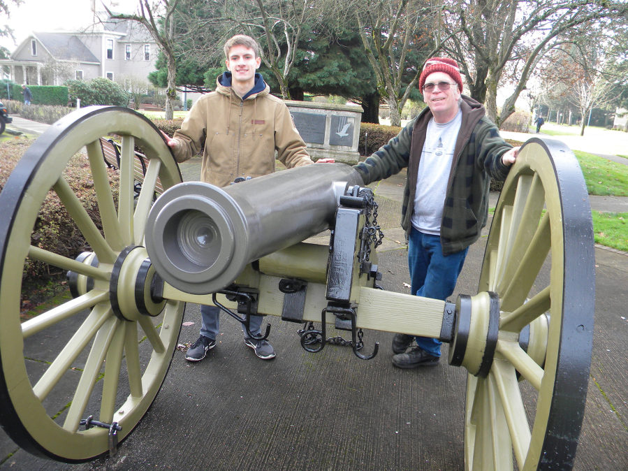 John Keller, left, and Fred Munhoven, who helped him restore a replica cannon at the entrance to Officers Row for the Fort Vancouver National Trust.