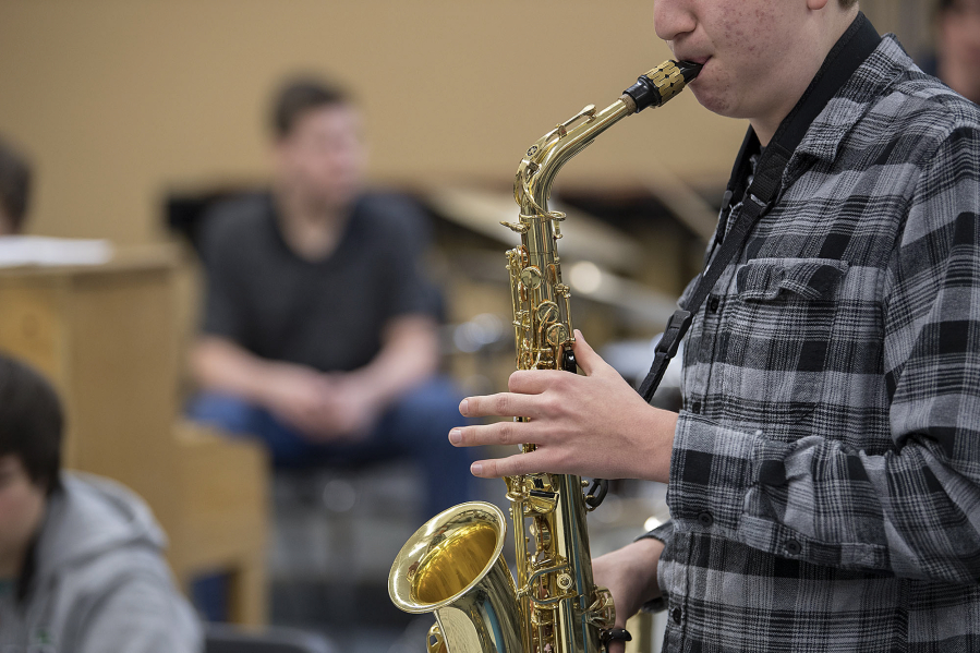 Students perform during jazz band practice at Battle Ground High School. Battle Ground High School&#039;s advanced group will headline the Clark College Jazz Festival, with an 8:30 p.m. performance Saturday.