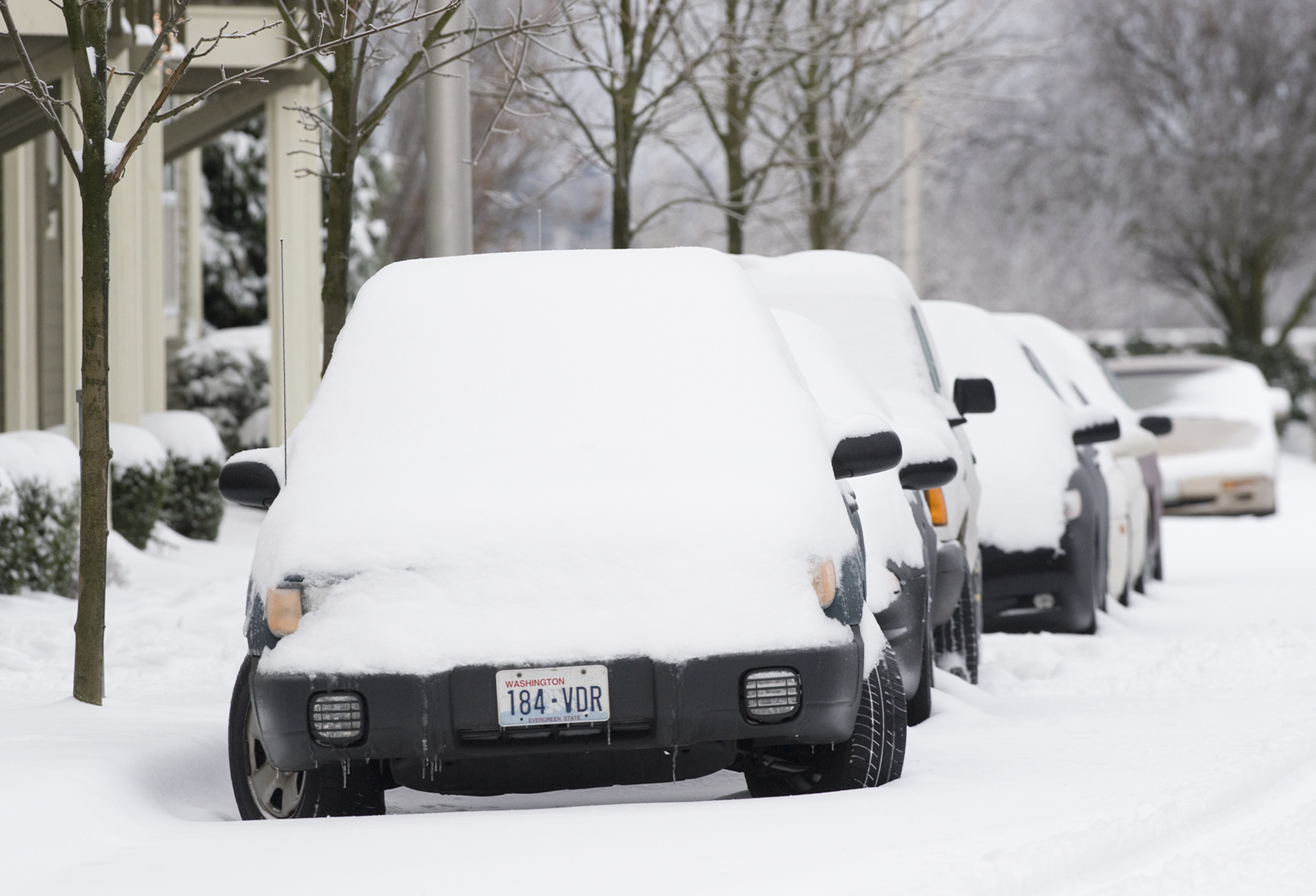 Snow and ice covered cars on Columbia River Drive in Vancouver on Dec. 21, 2008.