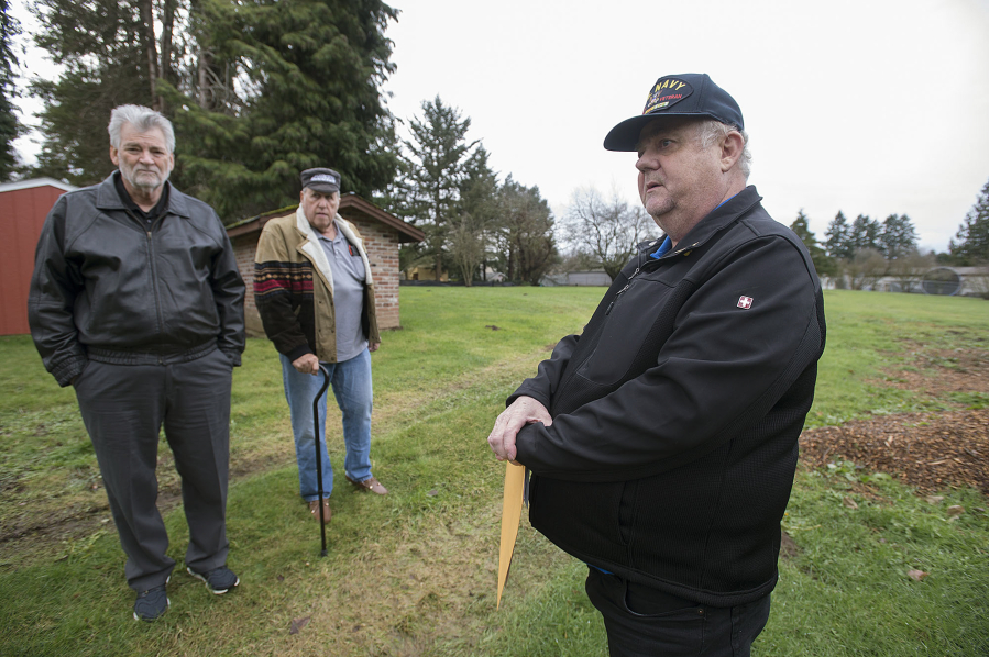 Veterans Ron Powers, from left, Ron Fryer and Michael Stacey talk about their idea for a microhome village for veterans in the West Minnehaha neighborhood in Vancouver.