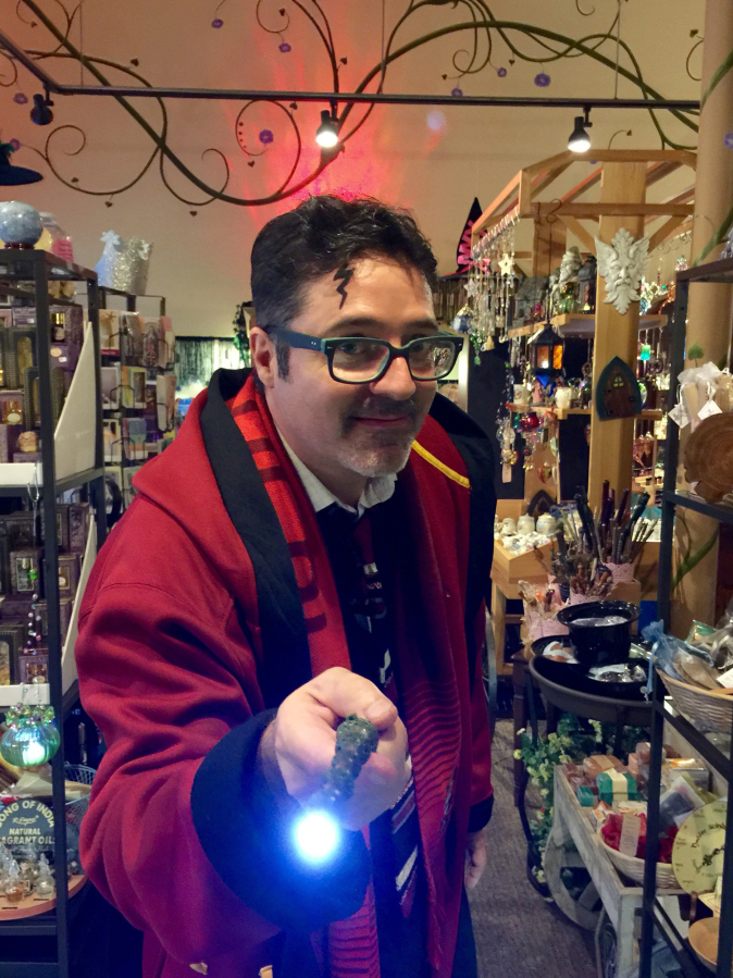 John LaBerge of Love Potion Magickal Perfumerie is dressed as the character Harry Potter.