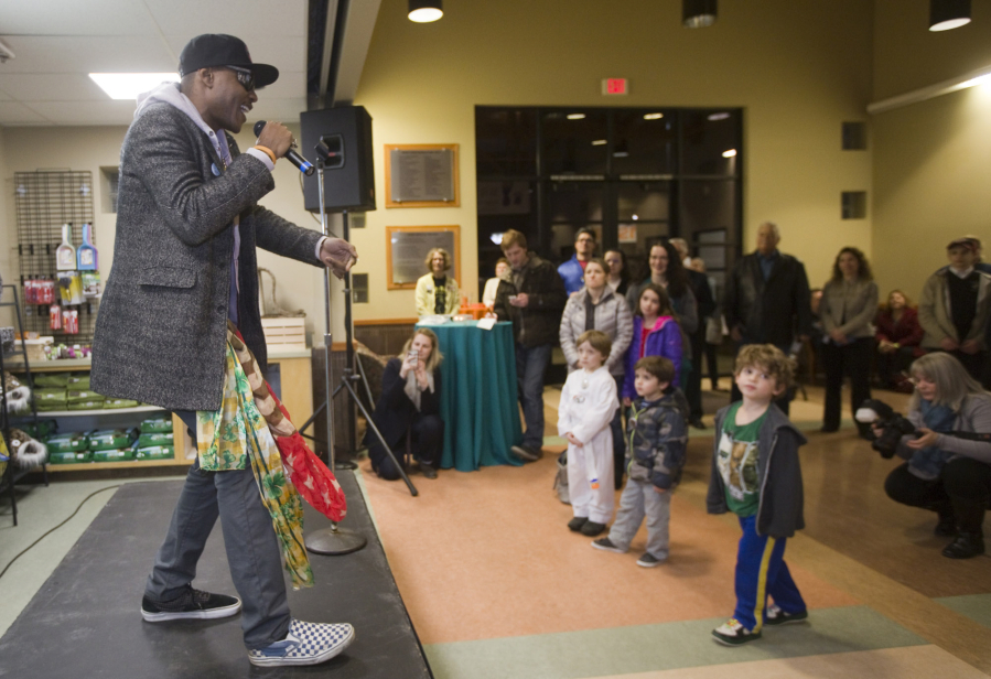 Portland-based cat rapper Moshow raps about his cats and about adopting pets Monday night for a crowd gathered at the Humane Society for Southwest Washington.