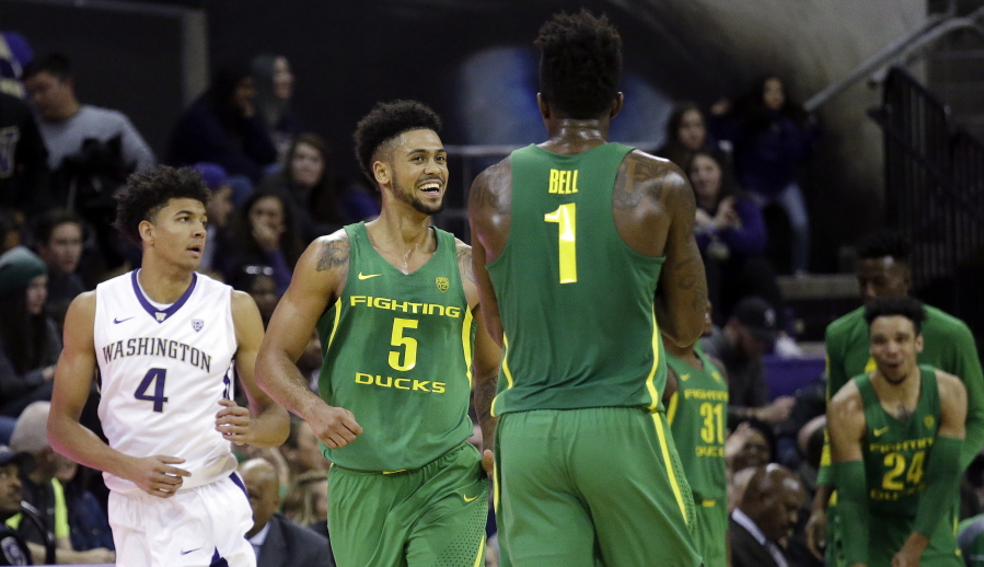 Oregon&#039;s Tyler Dorsey (5) smiles as he heads up court after hitting a three-point shot against Washington in the second half of an NCAA college basketball game Wednesday, Jan. 4, 2017, in Seattle. Dorsey led all scorers with 28 points and Oregon won 83-61.