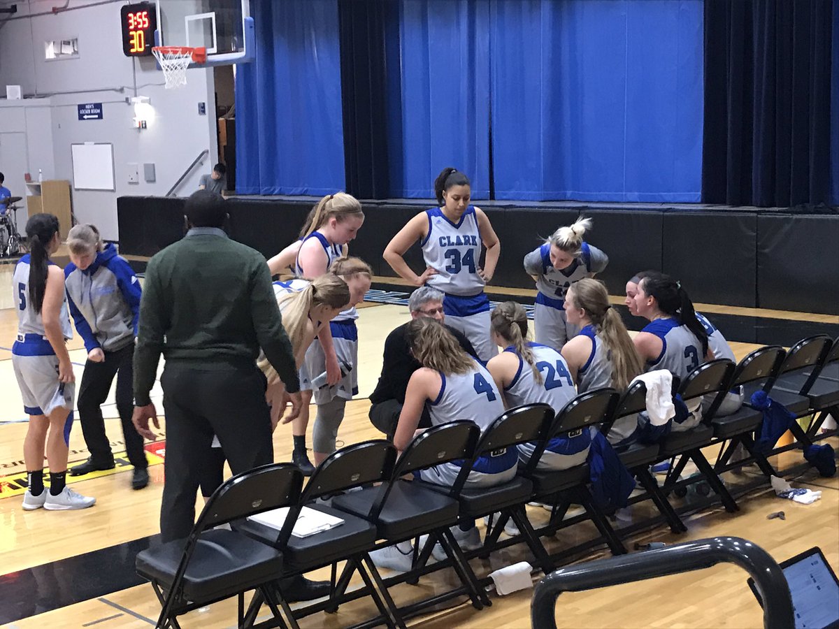Clark women's basketball coach Eric Harper talks to his team during a timeout during Saturday's eventual 80-77 overtime win over Southwestern Oregon for the team's first NWAC South Region win.